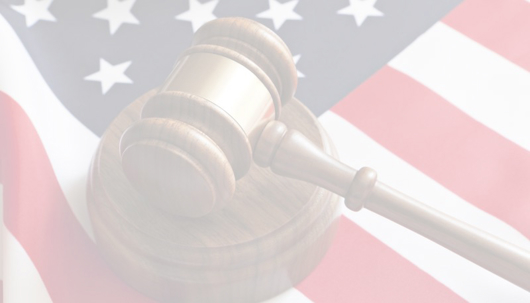An American flag with a gavel